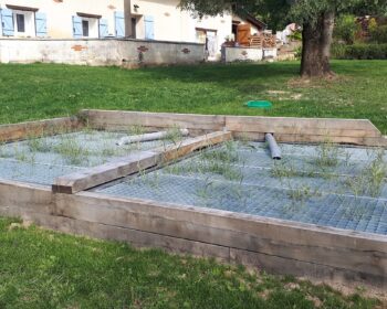 Jardin d'Assainissement au commencement de la pouce des roueaux
